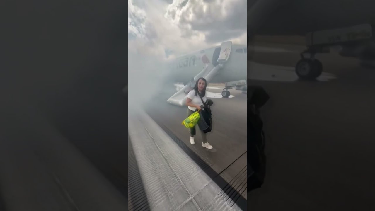 Passengers Evacuate American Airlines Plane On Emergency Slide After Fire Landing Gear