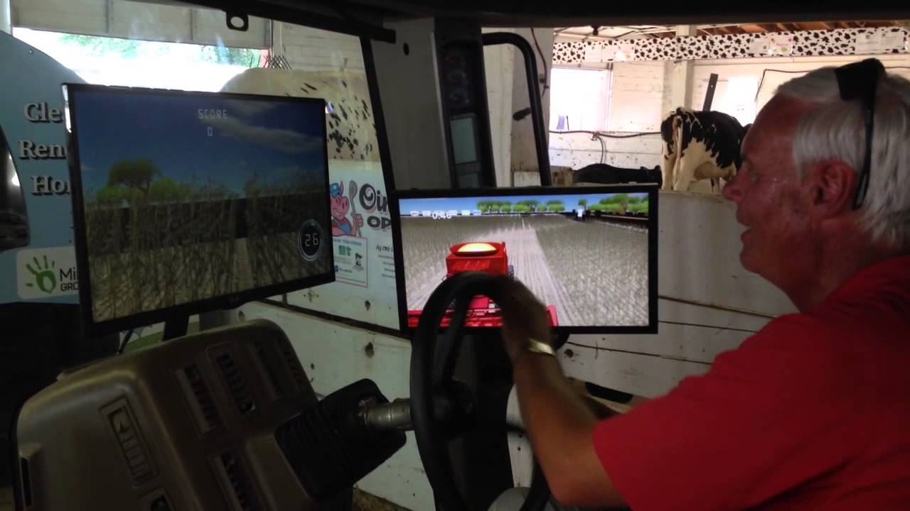 KDHL Farm Director Jerry Groskreutz Tests the Ag Cab Lab at the Rice County Fair