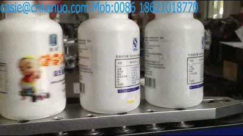 labeling video with transparent label sensor and date printer #roundbottlelabelingmachine