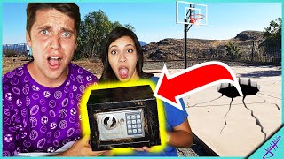 We Found An ABANDONED SAFE Under My BASKETBALL COURT In My BACKYARD!