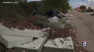 ‘A big eyesore’: Worsening illegal dumping site in Cypress prompts investigation from Harris Cou...
