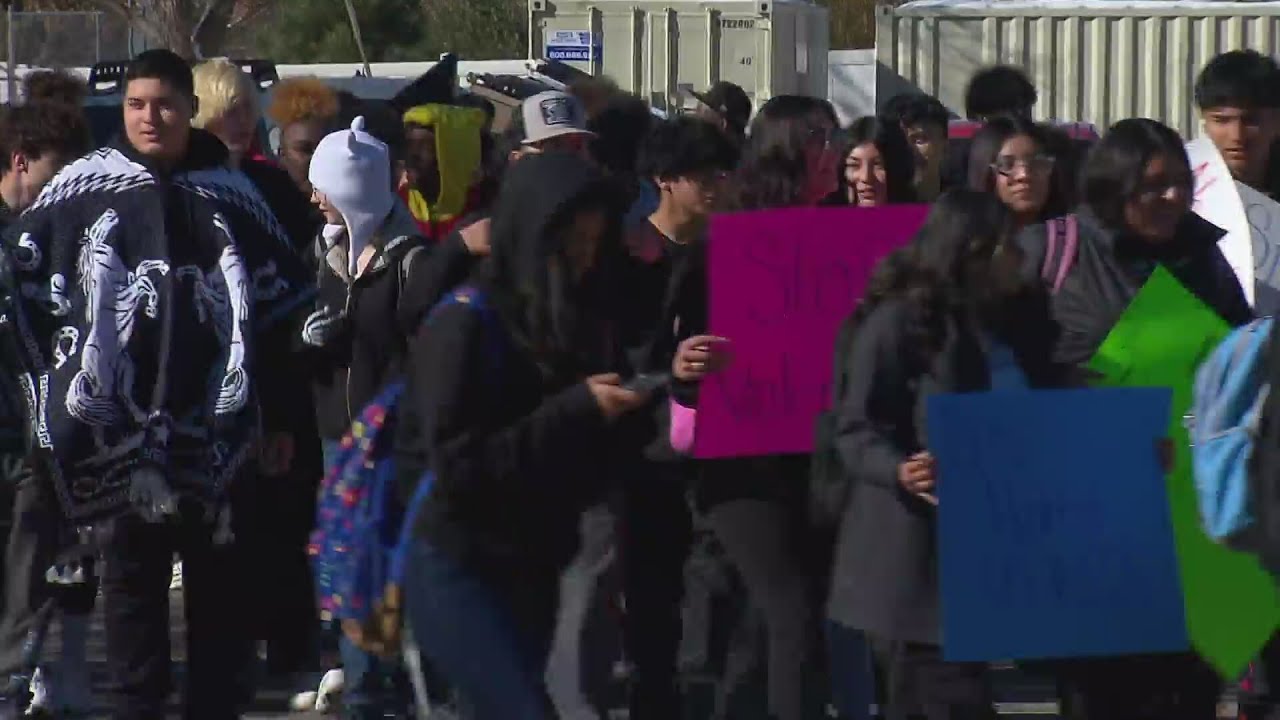 Dozens of Martin Luther King Jr. Early College students walk out of