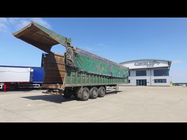 Incredible heavy machinery lifting tracked dumper off train tunnel moved by  powerful Scania XT 