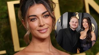Brianna Chickenfry returns to Golden Globes red carpet in plunging gown