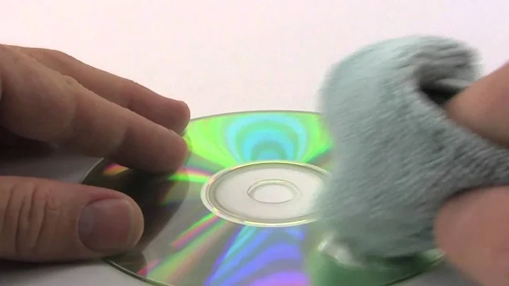 Cleaning Xbox Disc with Microfiber Cloth