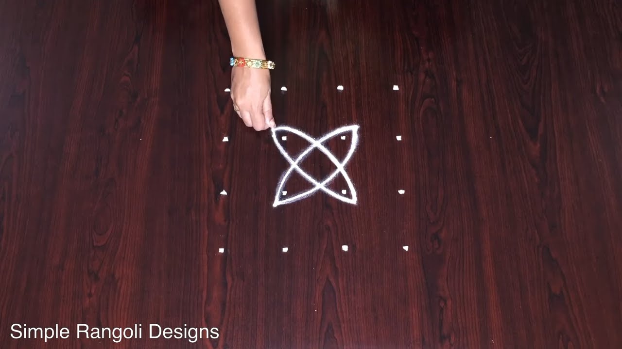 Small Rangoli Design For Door With 4 to 4 Dots