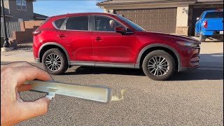 Mazda cabin air filter location and replacement shown on CX-5