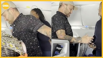 Passenger allegedly spits and harasses other passengers, flight crew. Plane diverts