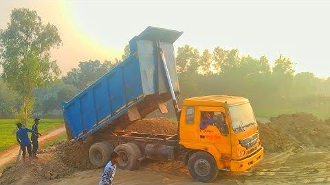 Mud Unloading Loading On The Top Hills River Sand Loaded Tractor Digital Unload Facility of Truck