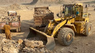 Caterpillar Loader Heavy Rock Loading | Dump Trucks & Trolleys at Mountain Quarry