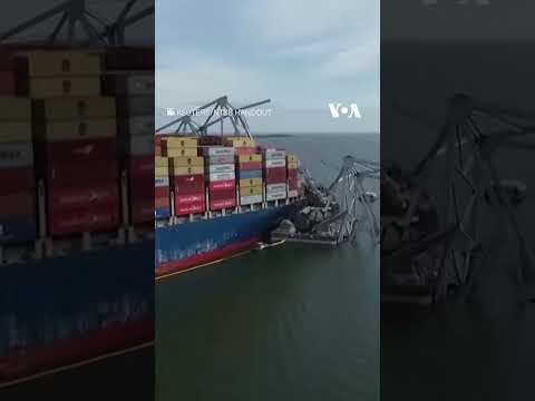 Drone Footage Shows Collapsed Baltimore Bridge After Cargo Ship Collision #shorts - VOA News.