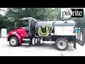 Custom-Painted Stainless Steel Toilet Truck | Pik Rite Vacuum Trucks