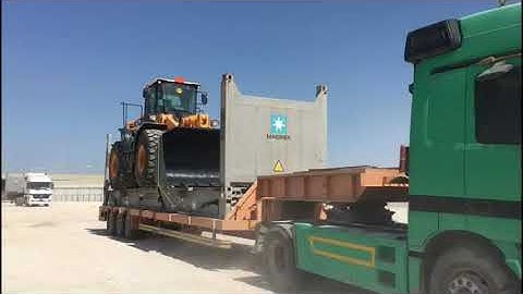 Construction equipment on Flat Rack