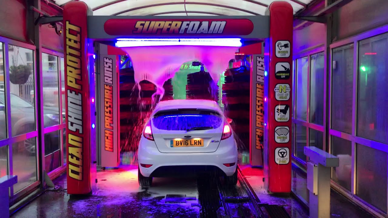 White Fiesta getting washed at the Main Street Car Wash in Larne