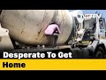 Migrants travelling by hiding in cement concrete mixer held