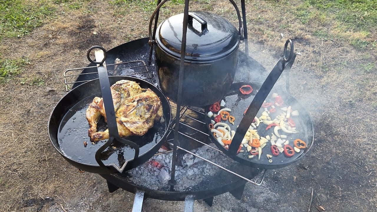 Cooking a whole chicken and searing it on a campfire gypsy style.