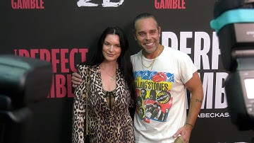 Julie Barzman and Kyle Stefanski attend the red carpet premiere of "The Perfect Gamble" in Los Angel
