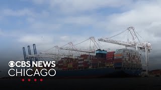 Federal agents board a container ship in Baltimore, Maryland