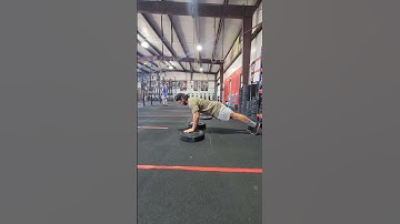 Deficit Plate Push-Ups