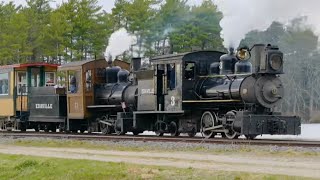 Edaville Railroad 75th Anniversary - Two-Foot Gauge Steam Special
The Edaville railroad is a two-foot narrow gauge loop in Carver, Massachusetts. The railroad was founded in 1947 by Ellis D. Atwood after he acquired equipment from multiple defunct two-foot railroads in Maine. The unique 24 gauge equipment still sees use today in both Massachusetts and Maine.
The Edaville Railroad was originally intended to support Atwood’s cranberry plantation, but it transitioned into a tourist railroad due to public demand. The railroad would operate narrow gauge The railroad’s management changed hands several times following Atwood’s passing in 1950 and the original railroad ceased operations in 1992. Much of the equipment was subsequently acquired by the Maine Narrow Gauge Railroad & Museum in Portland, Maine. In 1999, the Edaville Railroad was acquired and reopened with new equipment, new facilities, and a new adjacent amusement park. However, much of the mainline was eventually torn up to make way for a housing development, reducing the train rides to a smaller loop around the park and cranberry bog.
On an early spring weekend in 2022, the railroad celebrated its 75th Anniversary with a celebration and photo excursions organized by Maine Locomotive & Machine Works with the help of MNG. This event featured the reopening of a portion of the old mainline and the homecoming of Edaville’s former Steam Locomotive 3, which was trucked down from Maine for the celebration. This 0-4-4T Forney was built in 1912 by Vulcan Iron Works for the Monson Railroad in Northern Maine. Now owned by MNG, the 3 often splits time between MNG’s main operation in Portland and the Wiscasset, Waterville & Farmington Railway Museum in Alna, Maine.
The celebration also featured Edaville’s current steam locomotive 11, an 0-4-0 built in 1925 by H. K. Porter for the Raritan Copper Works in Perth Amboy, New Jersey. The 11 was originally three-foot gauge, but was rebuilt and regauged to operate at Edaville.
This celebration created a sense of nostalgia for many longtime railroad enthusiasts who grew up riding the Edaville Railroad and also acted somewhat as a farewell event as well. At the time, the property was for sale and the future of Edaville was uncertain. However, a few months later, Edaville was taken off the market and the organizer of this celebration was announced as the new operator. The new management has committed to continuing railroad excursions around the cranberry bogs but they intend to run on a more seasonal schedule.
00:00 Intro
01:20 Ex-Edaville 3
10:13 Edaville 11
15:25 Doubleheader Edaville Railroad 75th Anniversary - Two-Foot Gauge Steam Special