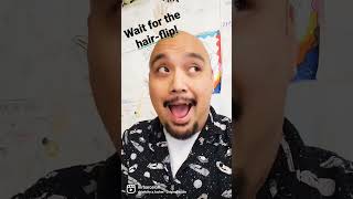Bald guy does a hair flip