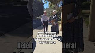 Helen Patton, General Patton's granddaughter, walking beside WWII veteran John “Jack” Moran