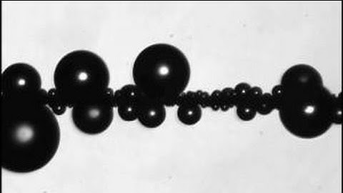 Self-propelled droplet removal from hydrophobic fiber-based coalescers