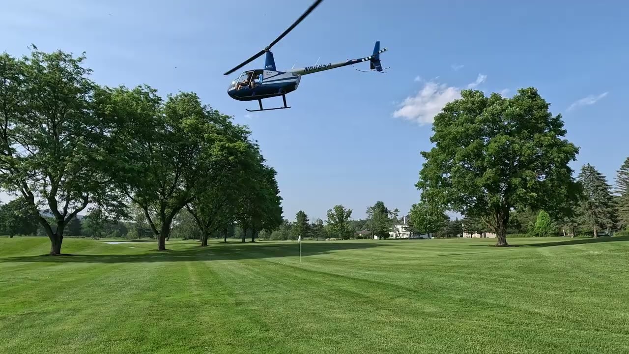 Dropping Golf Balls Out Of A Helicopter For A Conkling Center Fundraiser