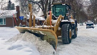 Snow Removal CAT Plowing Deep Snow with Wing