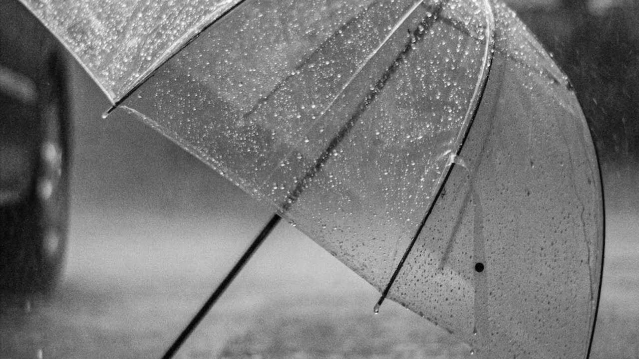 Heavy rain showers on an empty English street Rain sounds for