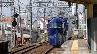 南海本線　鶴原駅2番ホームを50000系特急ラピートが通過　1番ホームに8300系普通が到着&発車