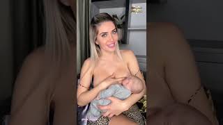 Russian Mom Breastfeeding To Her Child