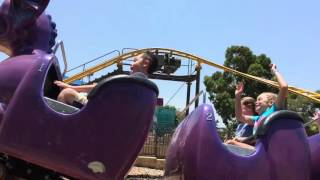 Hayden and Mason on the little roller coaster at Adventure World