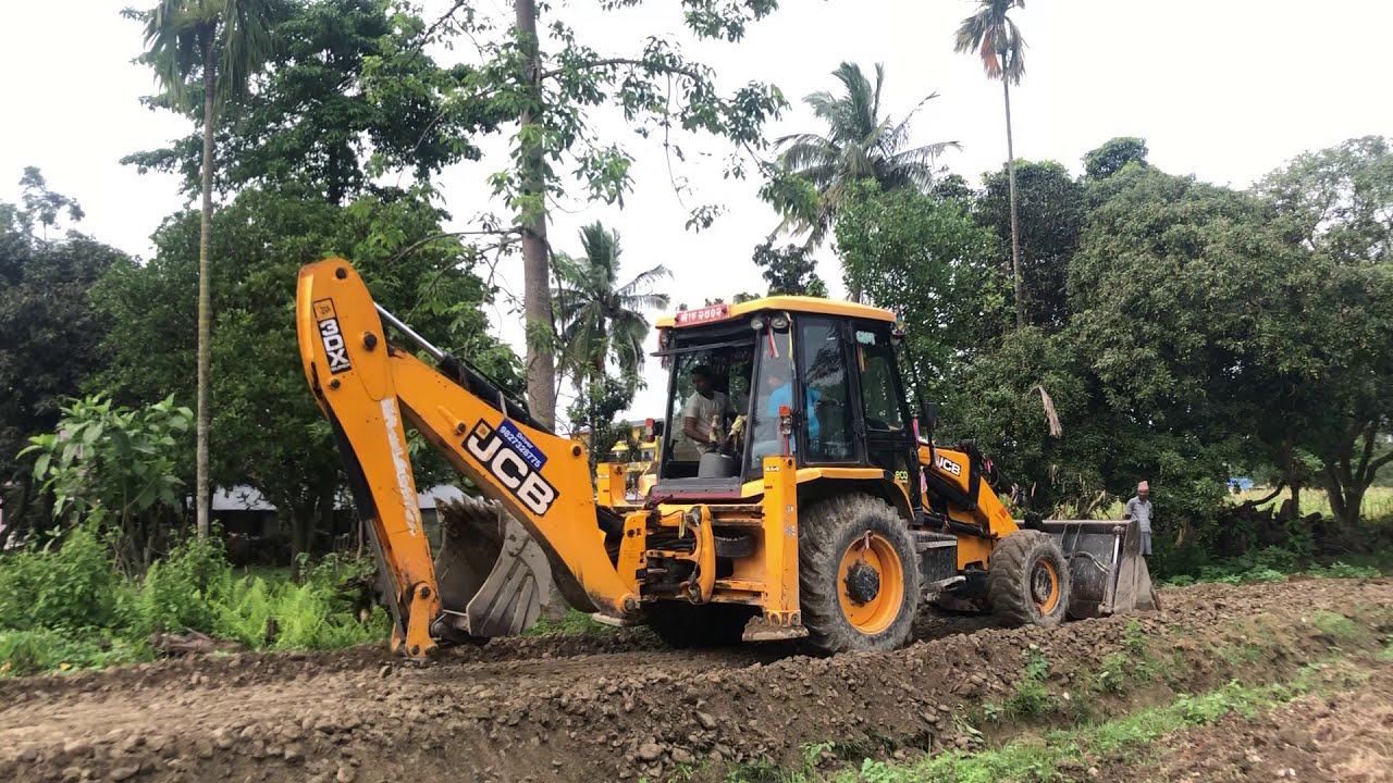 Working Mood, JCB Backhoe 3DX Super Machine Mixing Mix Ballast in a New Road