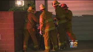 Woman Killed, Son Arrested In House Fire-Turned-Standoff