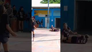 Volleyball Players Collide Chasing Ball, Both Fall