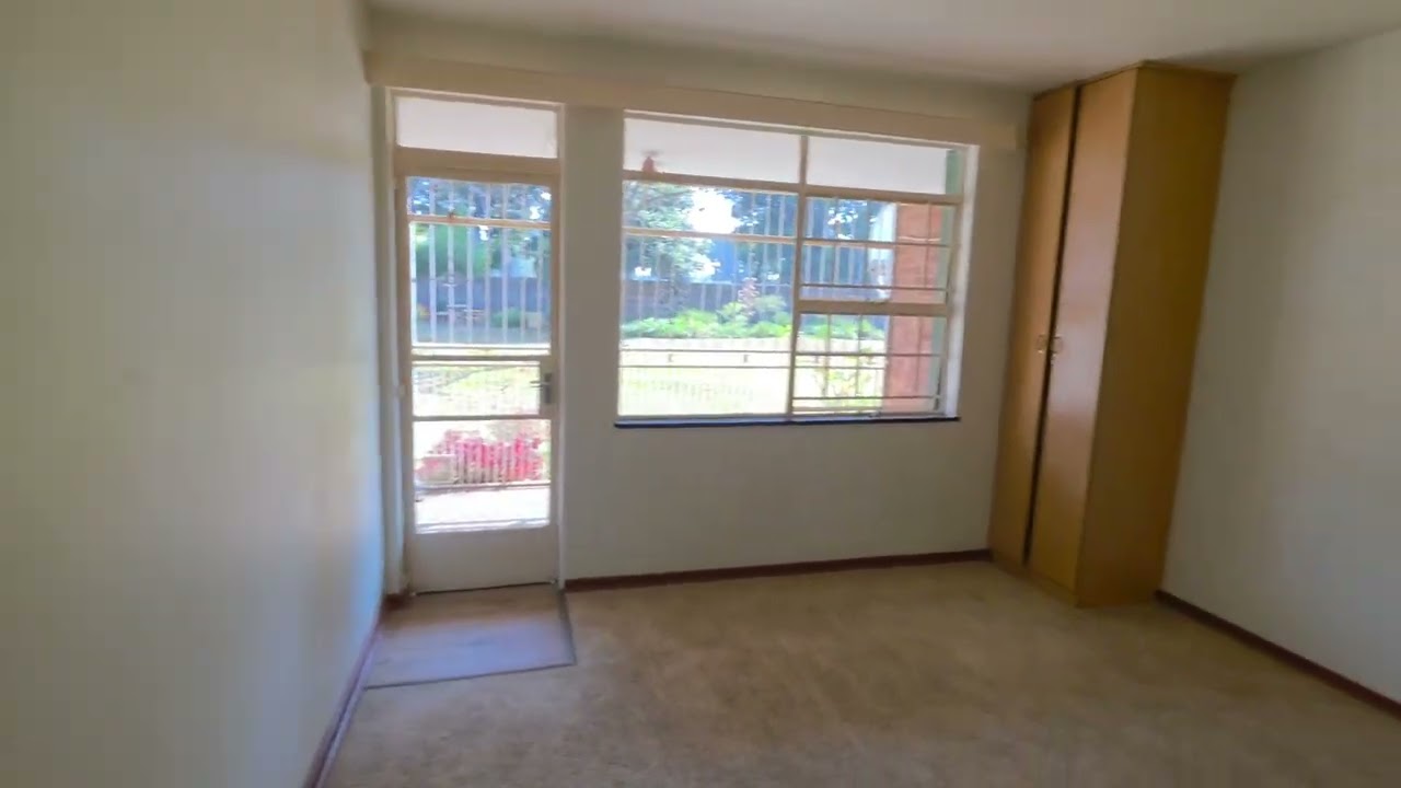 Spacious ground-floor apartment in a well-maintained complex.