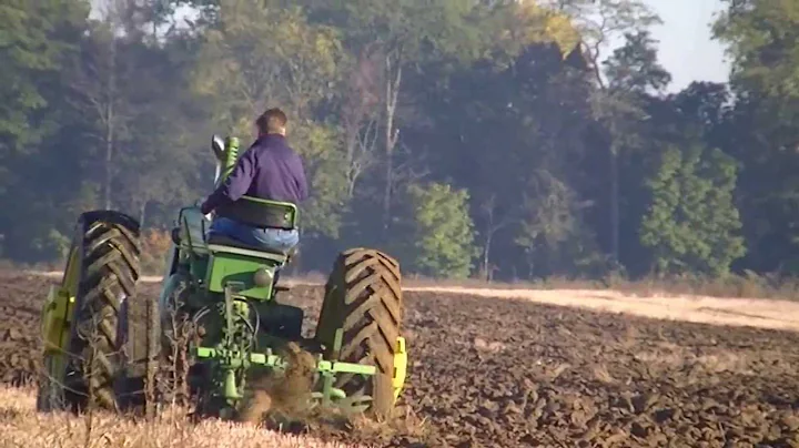 John Deere A & 80 plowing