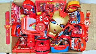 Box full of amazing red stationery  Ironman mask, spiderman figure, car pencil case, stationery set