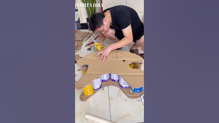 How brilliant! A dad turned milk powder cans and cardboard into a rocking horse for his kid.