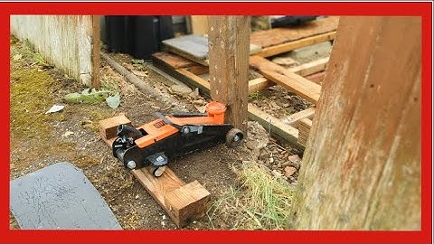 Will it work...Removing an old fence post with a car trolley jack.