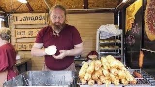 Fried Langos from Hungary and Fried Potato Pancakes. Street Food Tasted in Prague, Czech Republic