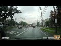 Truck passes school bus with flashing lights