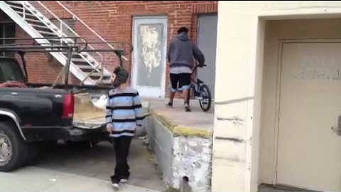 bmx 180 jump off of loading dock