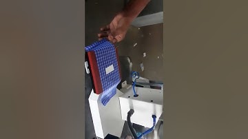 C0606D Pneumatic neck label transfer machine.