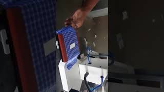 C0606D Pneumatic neck label transfer machine.