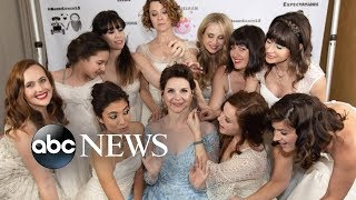 Bride has her guests wear their wedding gowns to her wedding | GMA Digital