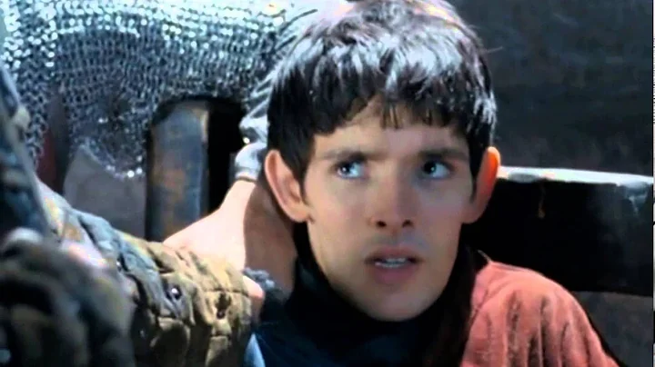 Merlin steals Arthur's food.
