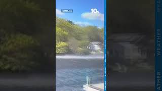 Rare dust devil moves over lake