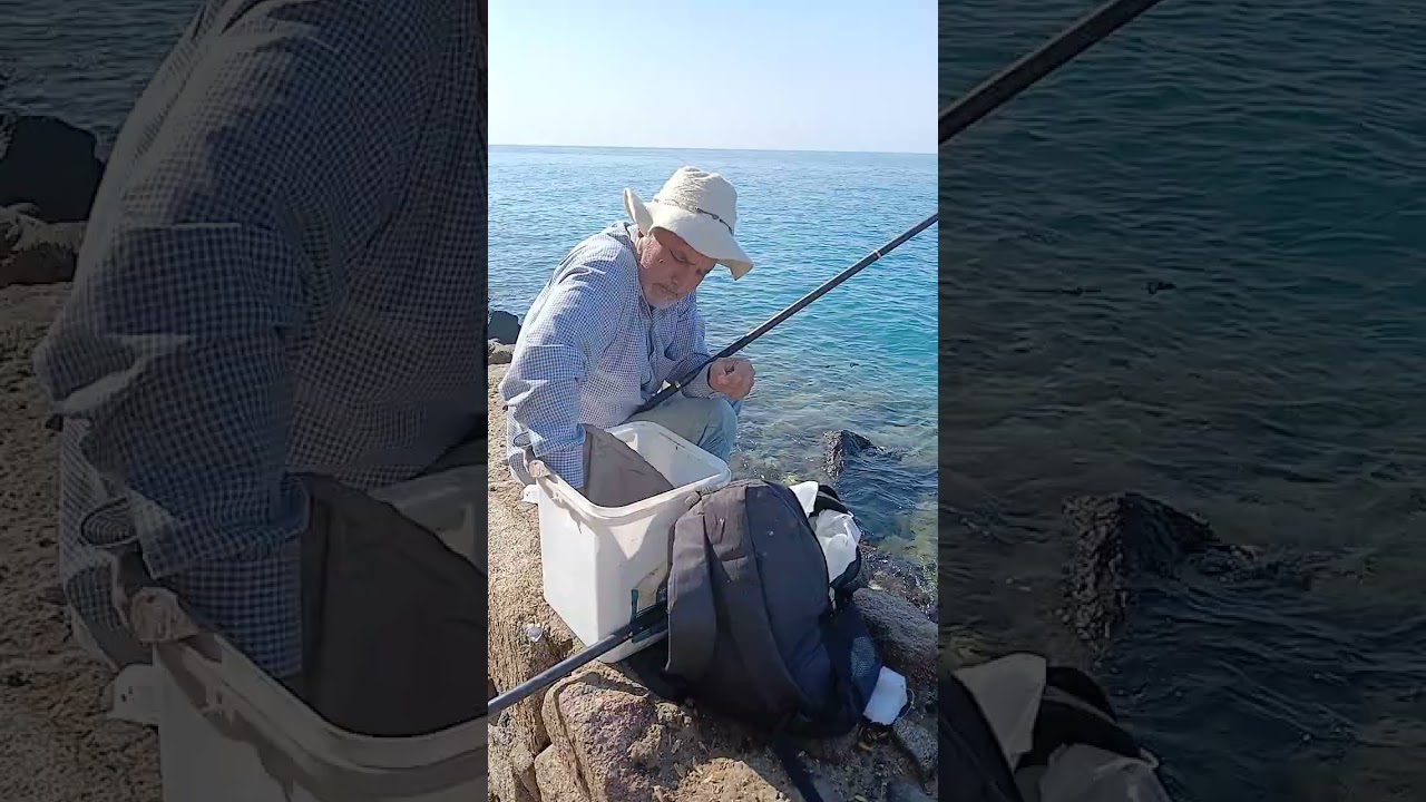 صياد يصيد السمك في البحر